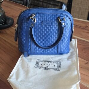 Gucci Embossed Blue Satchel